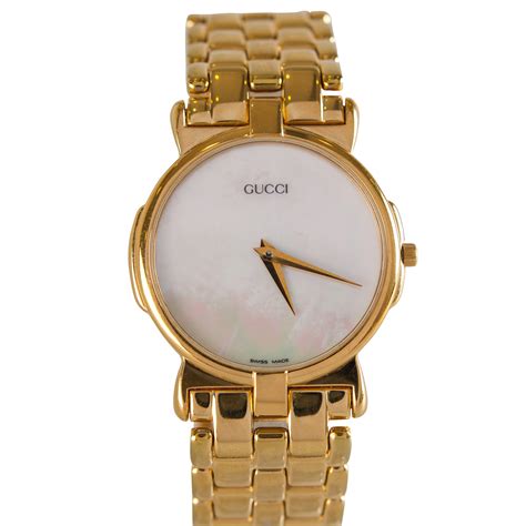 gucci gold watch with mother of pearl face|Gucci yellow gold watch.